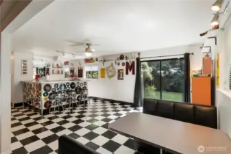 The booth adds to the vibe of the room, and will stay with the home.  You also have access to the back yard through the slider door.