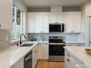 Kitchen has stainless appliances.