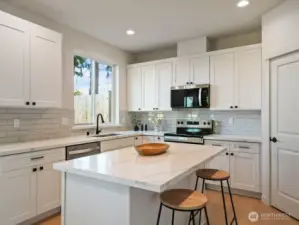 Kitchen is bright and welcoming.