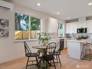 Eating space off of Kitchen has access to the huge covered patio.