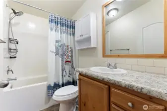 Main bathroom, located near the three guest bedrooms.