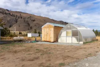 Greenhouse and storage shed.