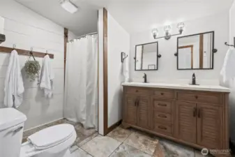 Large primary bath recently updated with double sinks.