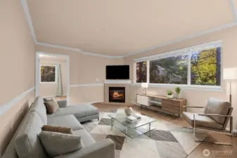 Virtually staged living room with gas fireplace at the corner, look out to territorial view.