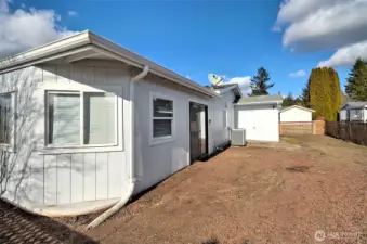 Fully-fenced back yard.
