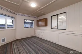 Another view of the hobby room behind the garage. Lots of storage!