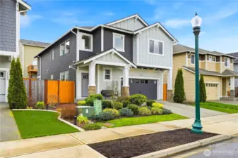 Beautiful modern home for sale in Covington, Washington featuring clean contemporary architecture, manicured landscaping, and inviting curb appeal in a desirable neighborhood with parks, trails, and community amenities.