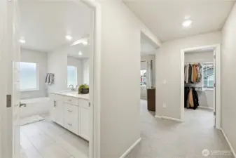 Alternate view of the spacious primary suite highlighting the comfortable layout of this Covington WA home for sale built in 2020.