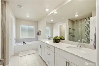 Private primary bedroom with large windows and relaxing atmosphere in this Covington Washington real estate listing.