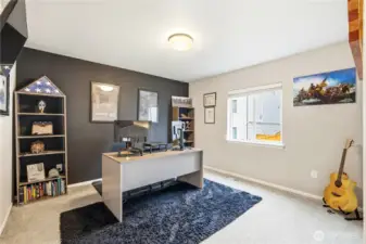 Additional upstairs bedroom or flexible living space inside this Covington WA home for sale, ideal for a home office, playroom, or guest bedroom in this spacious Covington Washington home.