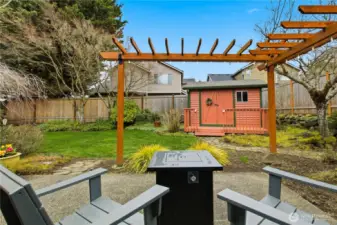 Arbors, outdoor seating areas, mature landscaping, garden/play shed...what more could you want?