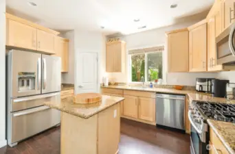 Stainless steel appliances with gas stove and easy care granite counter tops