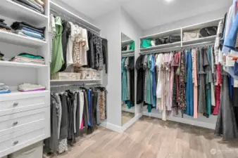 The upstairs primary walk in closet has custom built in's.  It truly is large and roomy.