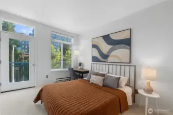 Bedroom large enough for a desk and bed