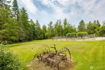 Front yard with antique tiller and privacy all around where the deer and bunnies love to visit.