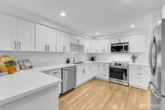 Brand new kitchen with beautiful cabinetry.