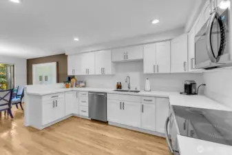 Stainless gallery appliances and custom handles.
