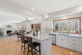 Spacious open Kitchen, breakfast bar, with French Door access to the backyard and deck - Great for entertaining!