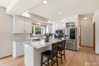 Tastefully updated Kitchen with breakfast bar