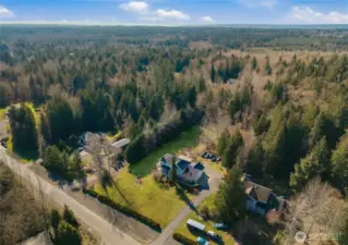 Overhead view of the 4.9 acre property that goes well beyond the backyard tree line