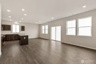 open floor plan on main floor.  Pictures are for representational purposes only. Materials and colors may vary.