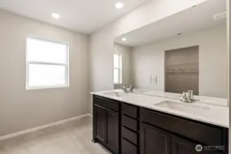 Primary bath with 2 sinks and counter space.  Room to share even.  Pictures are for representational purposes only. Materials and colors may vary,