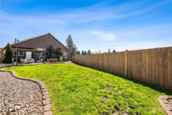 A backyard oasis for endless enjoyment. Large side yard (not pictured) provides additional space and access from the front for small recreational vehicle storage.