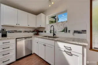 Beautiful cabinets and countertops. Stainless appliances. Ready to go!