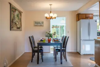 From the dining room, step out to the sunroom.