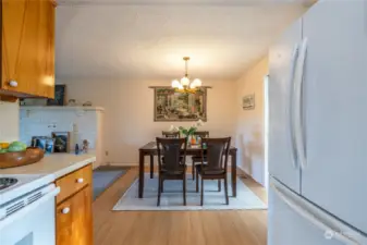 If you are cooking in the kitchen, you will have a great view of your guests in the dining room.