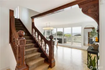 The stunning banister & woodwork from the Old Tacoma Hotel is a true showpiece and leads to the spacious dining room with more beautiful views