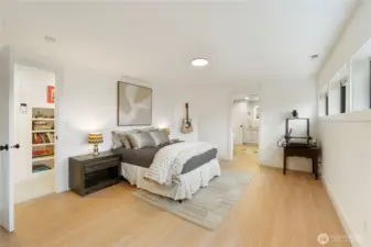The lower level suite features Luxury Vinyl Tile Flooring and cheery windows overlooking the grounds.