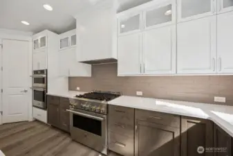 gas range/oven plus mounted second oven/micro combo.