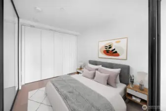 Virtually staged Bedroom w option to open all heavy sliding doors. This feature and layout make it on of the most desirable floorplans.