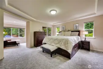 Spacious Primary Suite with beautiful millwork and coffered ceilings