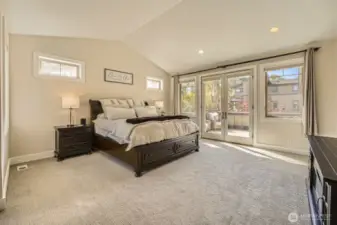 Massive primary bedroom with french doors and power blinds leading to your private patio to soak up the morning sun.