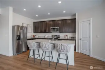 Image of model home of same plan. Colors/finishes may vary.