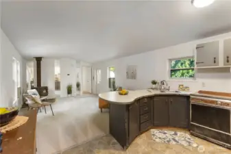 Light & bright home with vinyl windows, metal roof and cozy wood-burning fireplace.