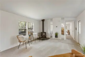 Cozy wood-burning fireplace will heat the entire home.