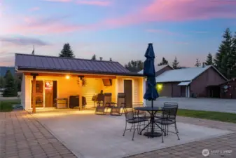 Tucked beside the main home, the cozy cabana—affectionately known as “The Lodge”—offers the perfect spot to gather, watch Seahawks games, or host patio parties!