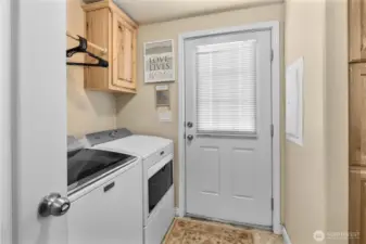 Laundry room in ADU; all appliances in both homes will stay.