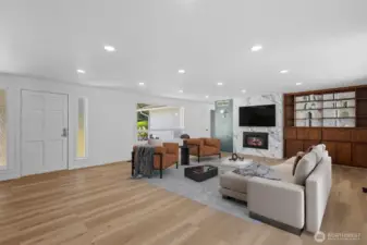 Virtually staged. Warm LVP flooring and fresh paint throughout create an inviting space.