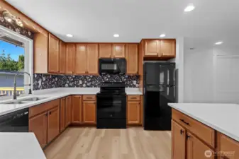 Abundant cabinetry provides ample storage for supplies and essentials.