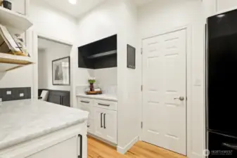 Door leading to the side turned 3 car garage.