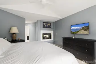 A double-sided gas fireplace and a generous walk-in closet.