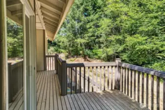 Deck off dining room with stairs to below