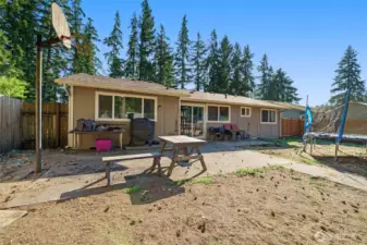 Large backyard, perfect for entertaining, gardening, kids play area, dogs,