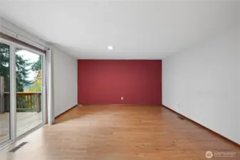 The kitchen flows into the family room with access to one of two entertaining decks