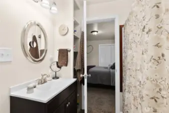 Adorable bathroom with 2 entrances. One from primary bedroom and also off main floor