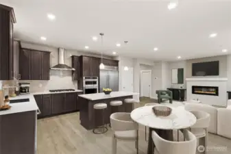 Gorgeous kitchen with plenty of storage and counter space to prep your meals or host a dinner party!  48" counter depth side by side built in refrigerator, gas cooktop and built in micro/oven - home for sale may include different color cabinetry.  Virtually staged